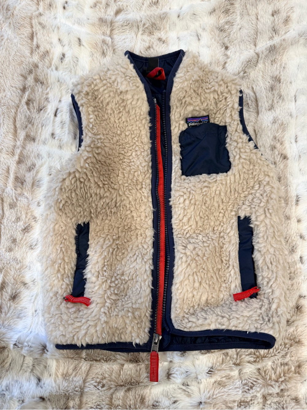 Patagonia Kids Cream Sherpa Vest with Navy Trim and Red Zip Accents